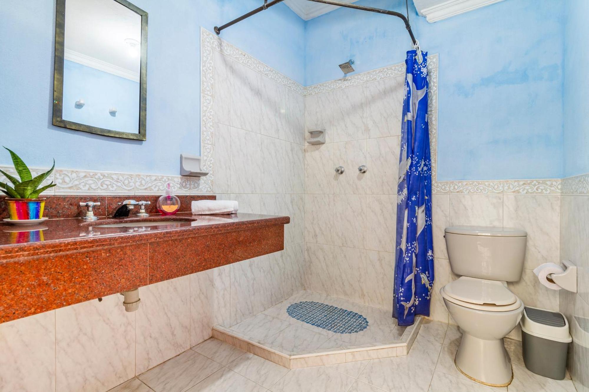 Chambre Quadruple avec Salle de Bains Commune